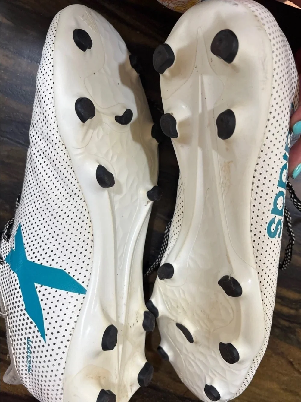 Adidas X 17.3 FG football cleats in a white and teal colorway. Size 10&1/2
